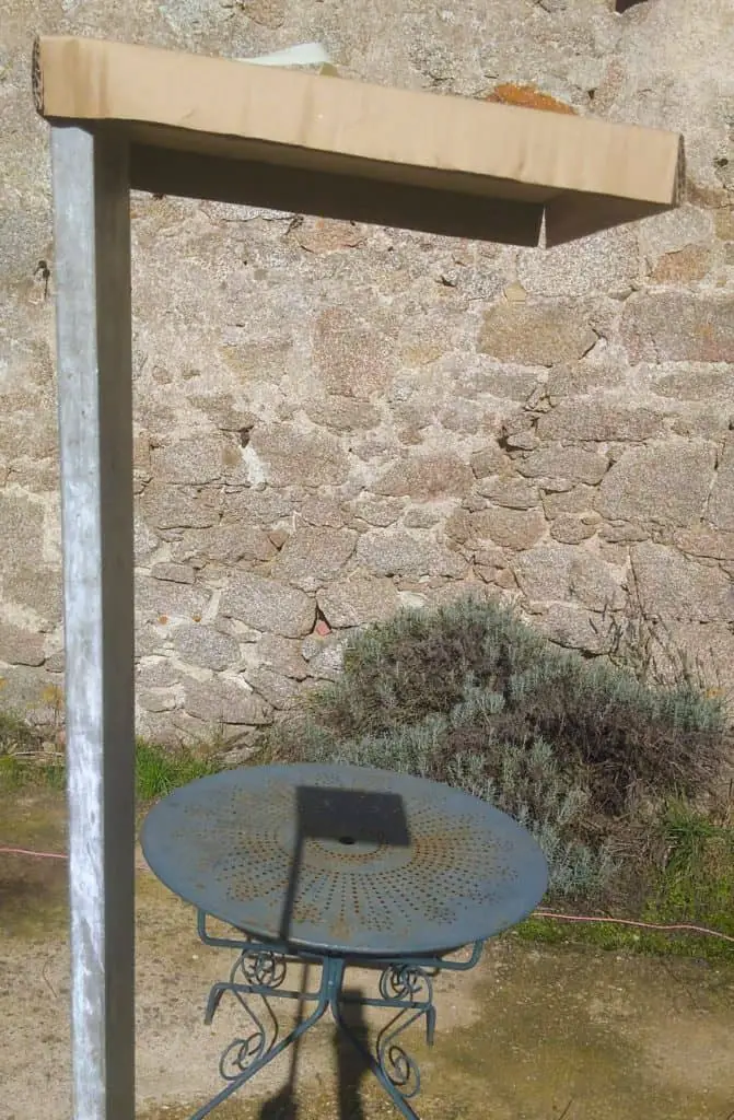 Using a post and card to check where sun shade shadow will fall